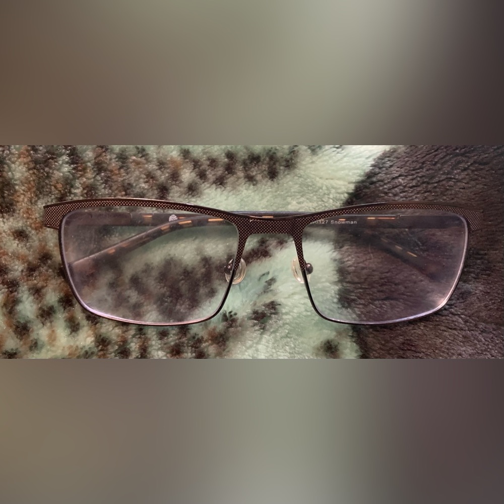 Brown rimmed rectangular glasses frames